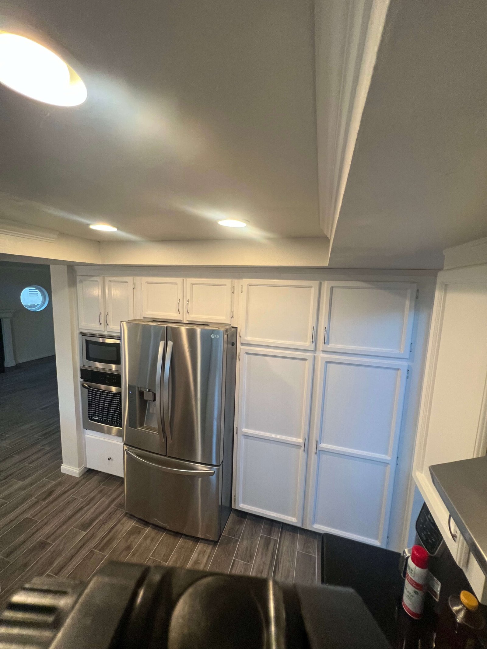 pantry addition next to stainless steel refrigerator La Mesa