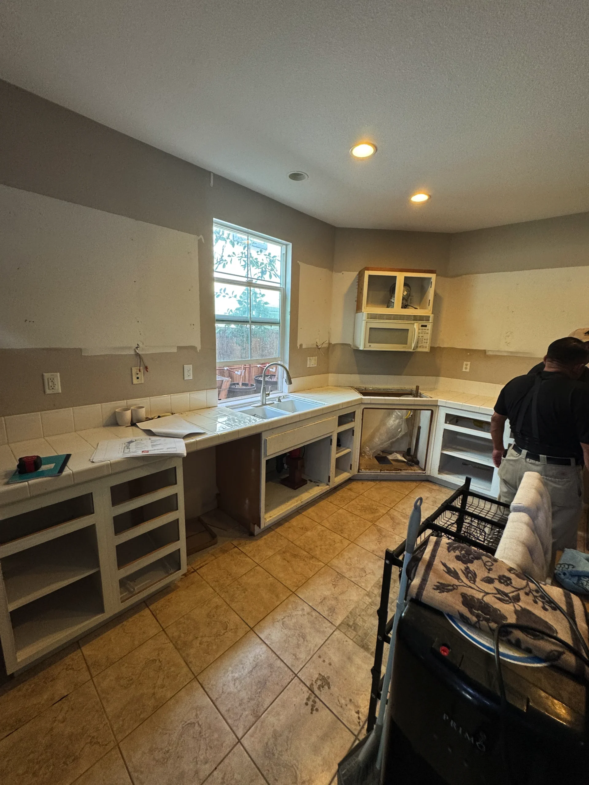 gourmet kitchen with double ovens and installed cabinets in San Marcos