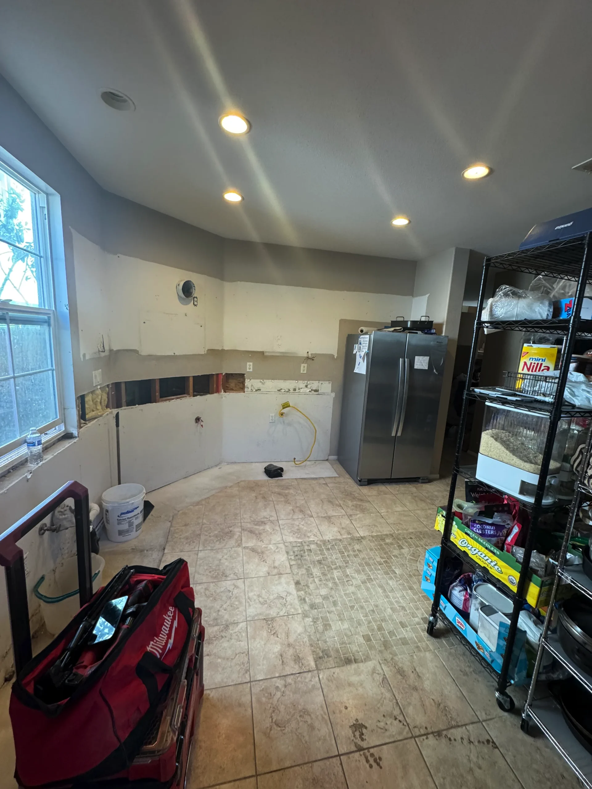 gourmet kitchen with double ovens and installed cabinets in San Marcos