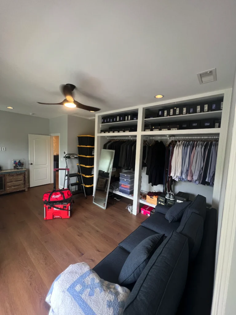 custom open-concept closet system with extensive shelving