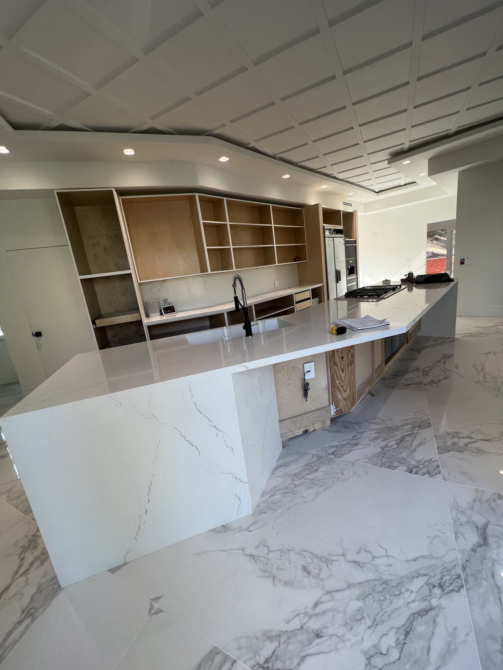 frameless flat-panel cabinets with quartz island Rancho Santa Fe