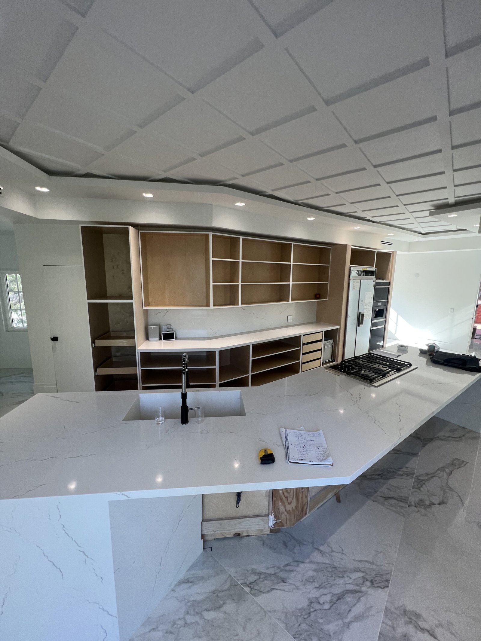 frameless flat-panel cabinets with quartz island Rancho Santa Fe