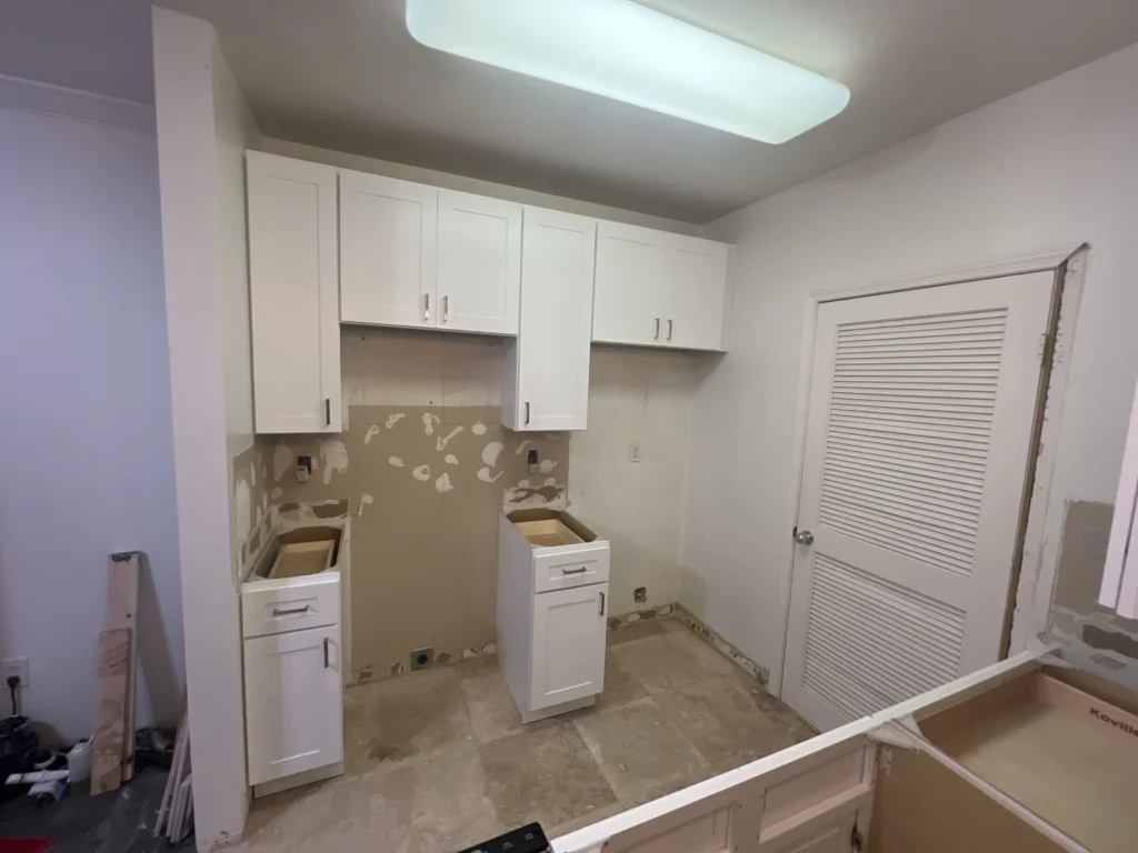  installing new kitchen peninsula for Ali's project in Del Mar