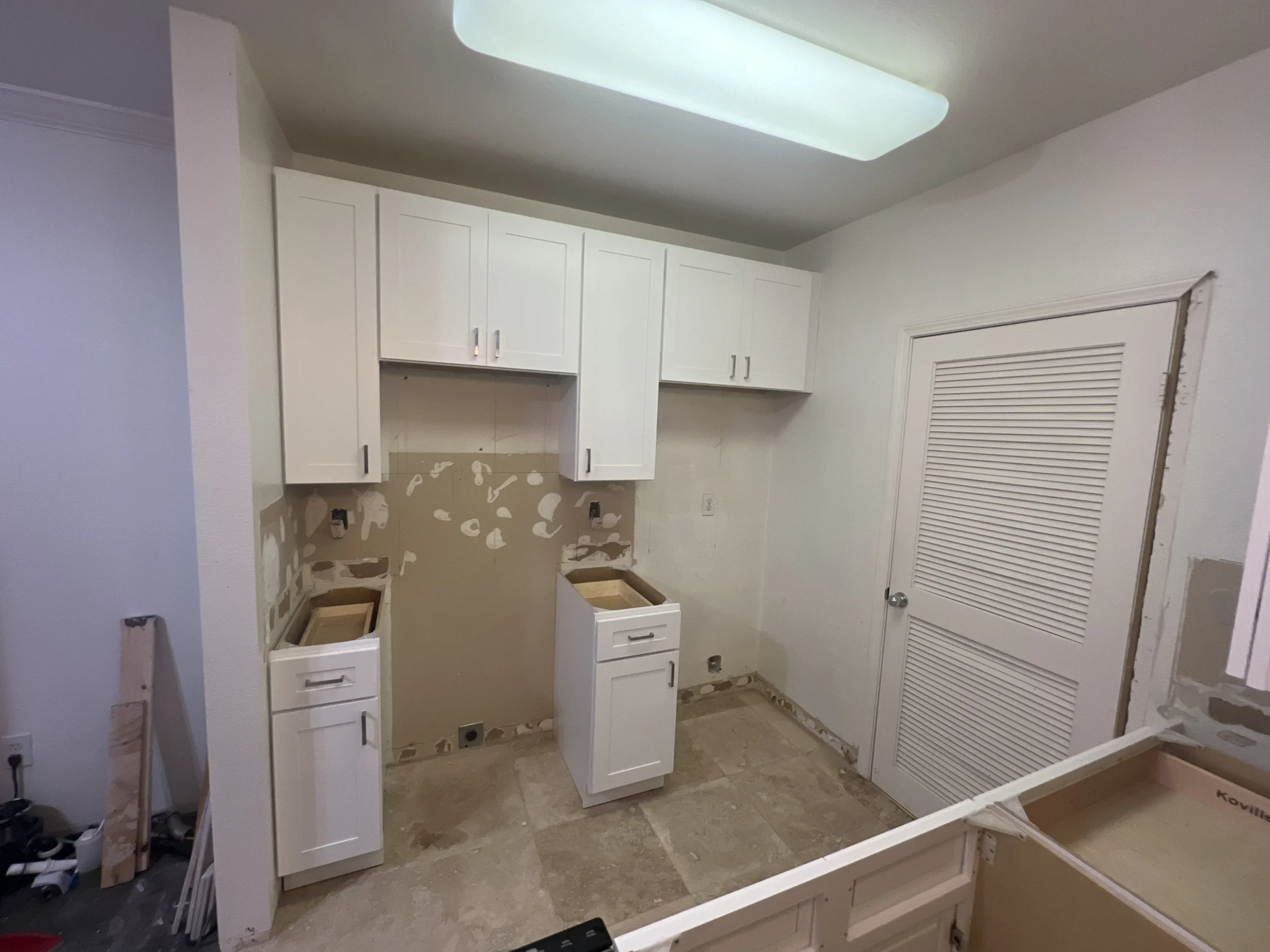  installing new kitchen peninsula for Ali's project in Del Mar