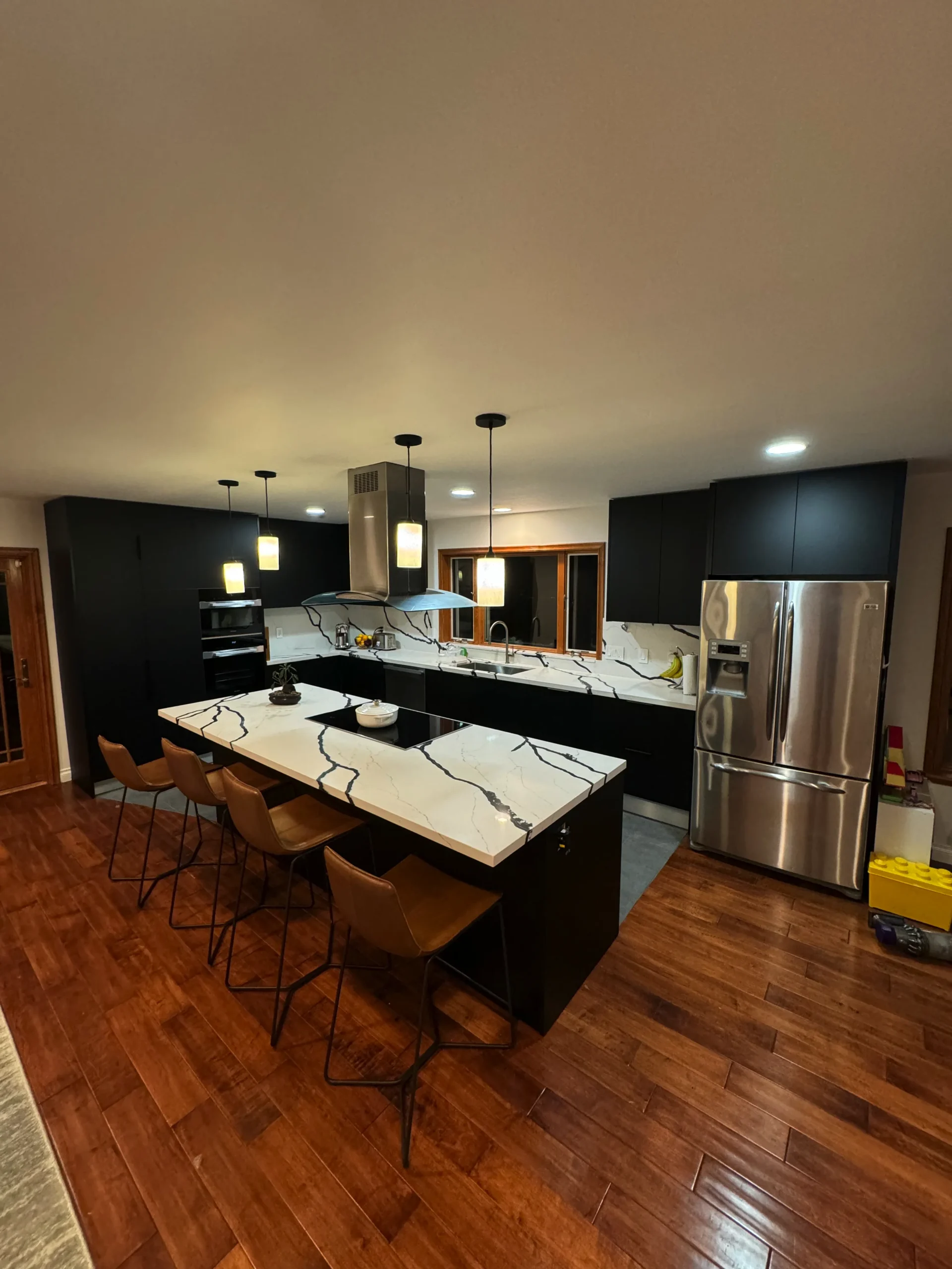 large kitchen island with waterfall quartz countertop Escondido