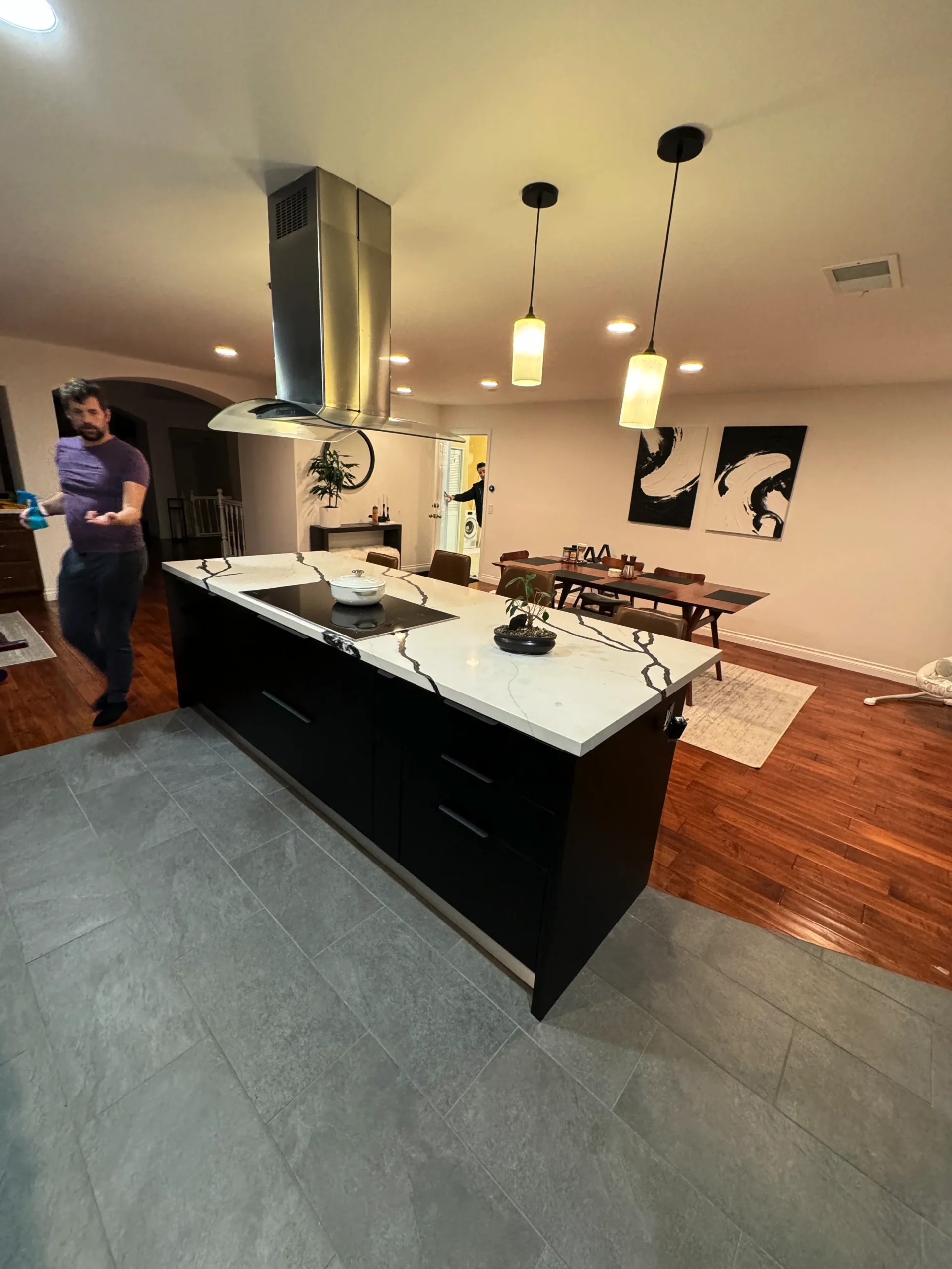 Shirin's handleless black flat panel kitchen in Escondido