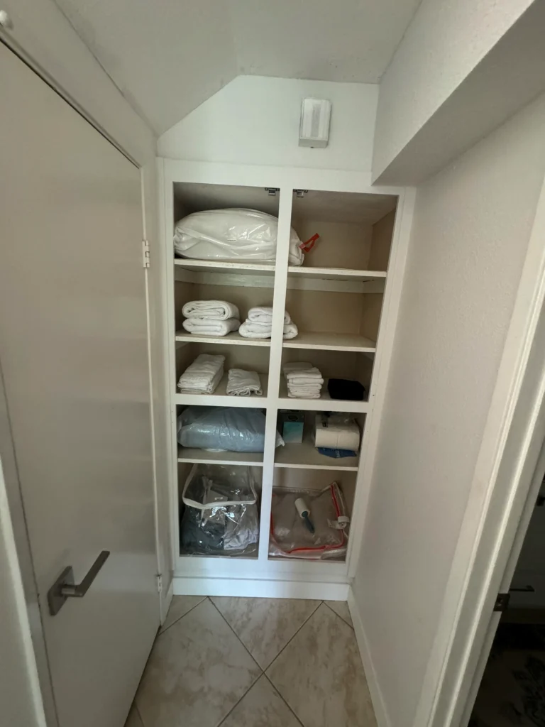 installing white shaker pantry doors on open shelving