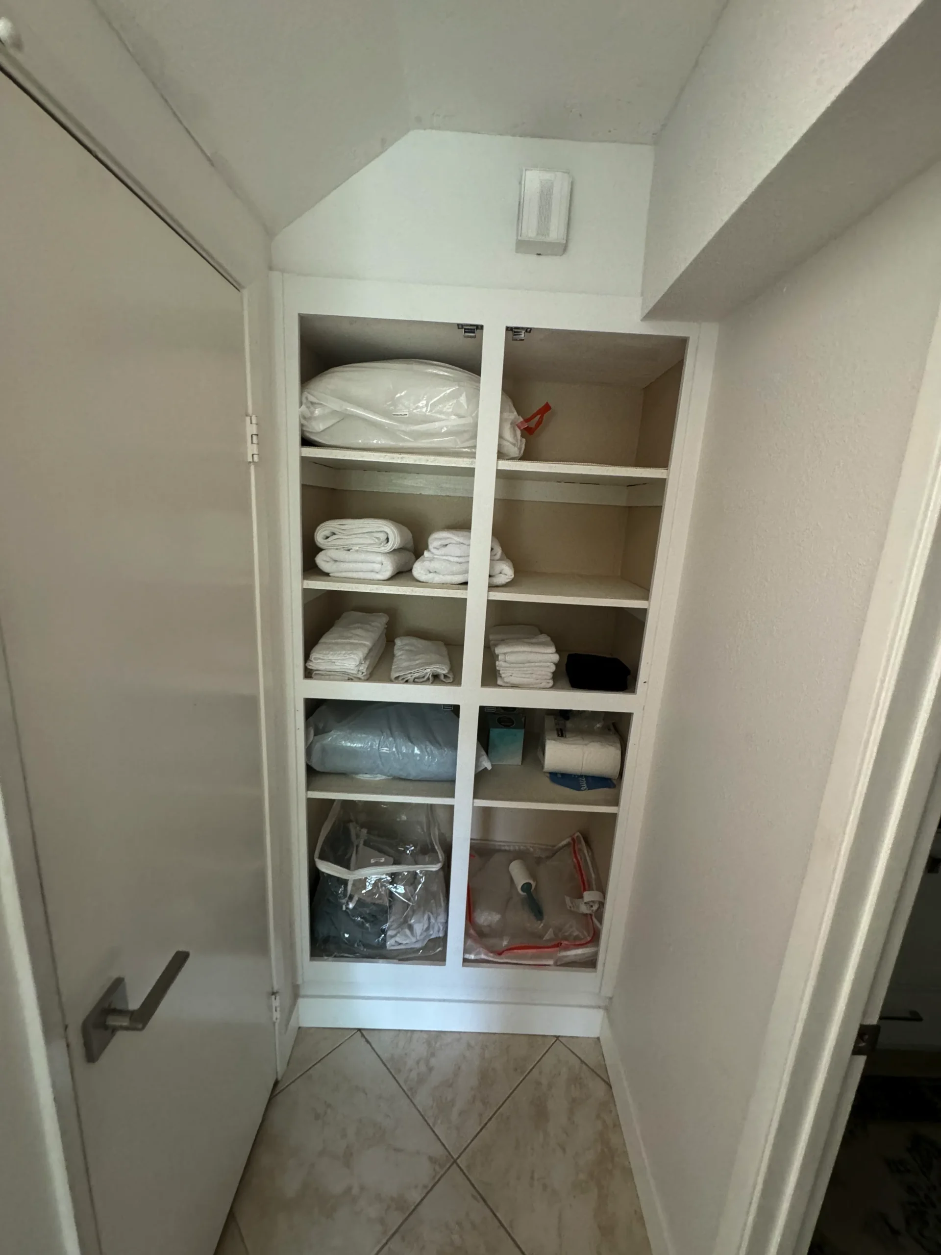 installing white shaker pantry doors on open shelving
