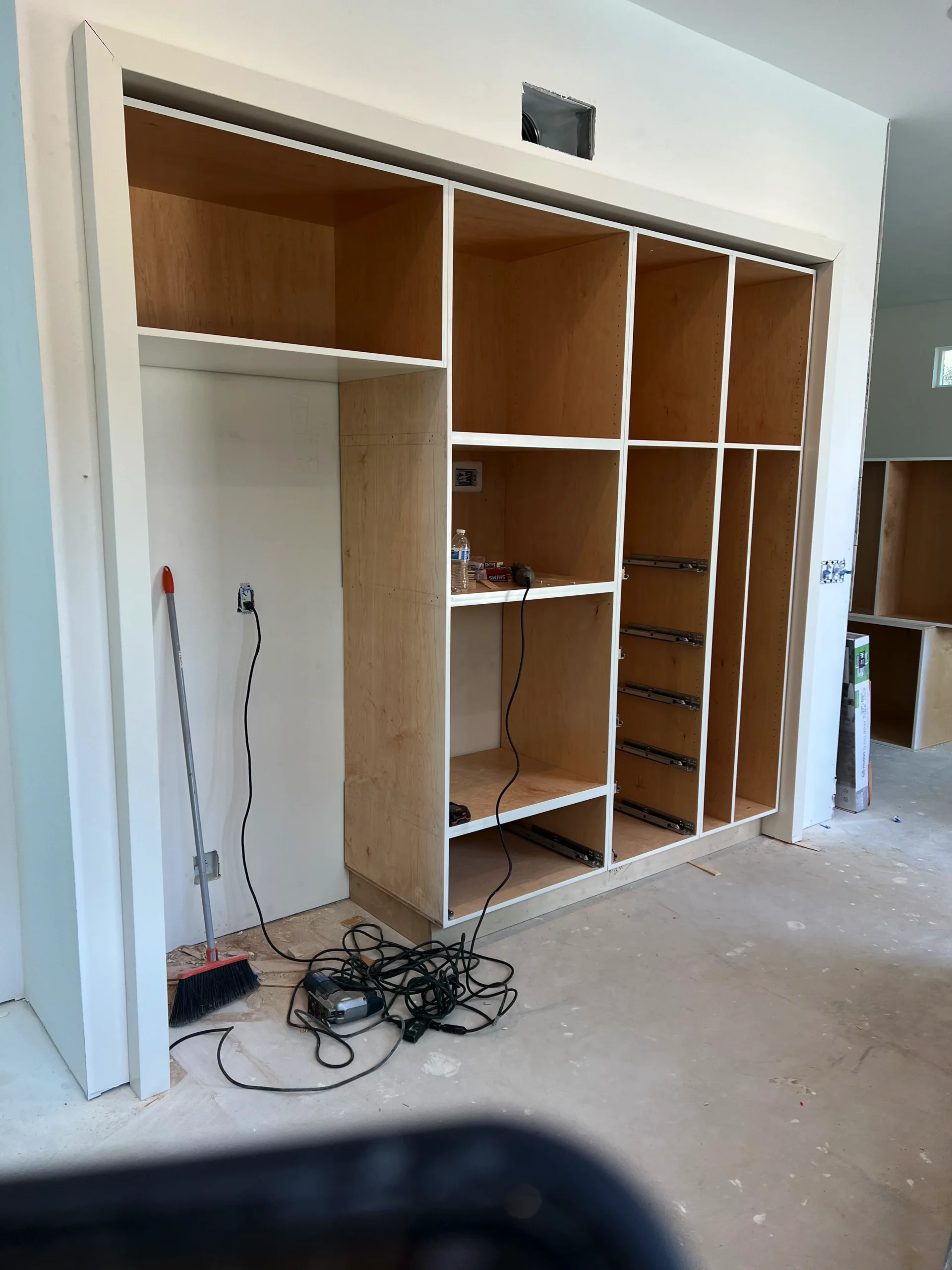 frameless flat panel cabinets with two-tone wood and white finish La Jolla