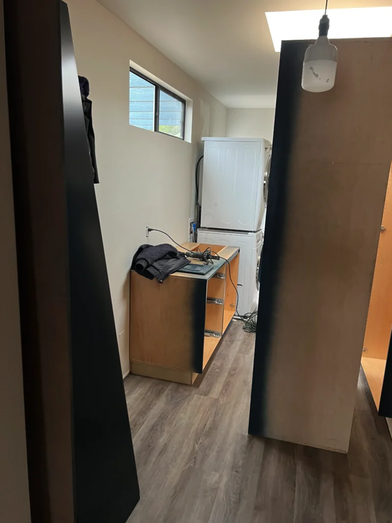 deep blue custom cabinets with large ring pull hardware