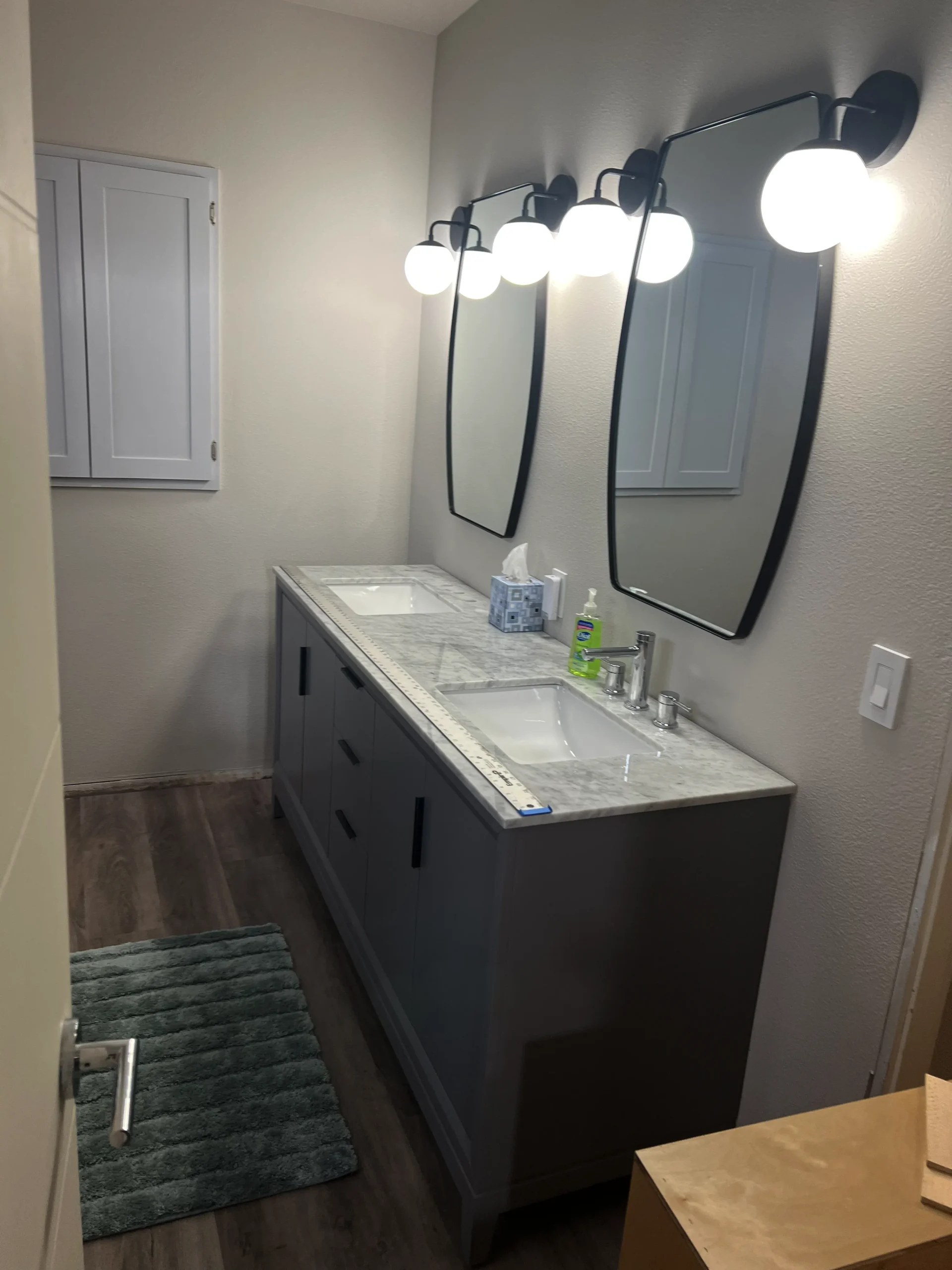 grey flat panel double bathroom vanity with marble top