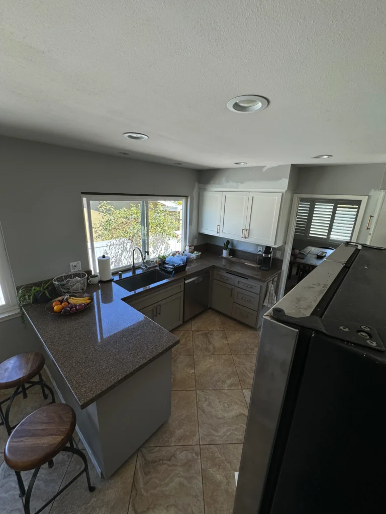 kitchen reface project with shaker doors and modern copper hardware