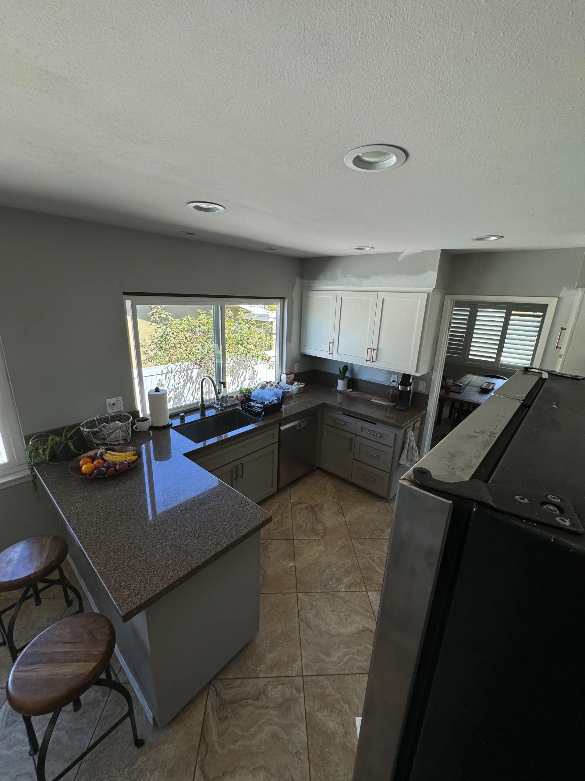 kitchen reface project with shaker doors and modern copper hardware