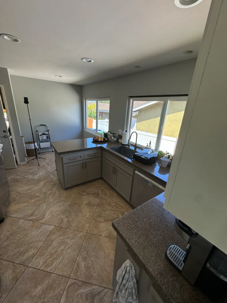 kitchen reface project with shaker doors and modern copper hardware