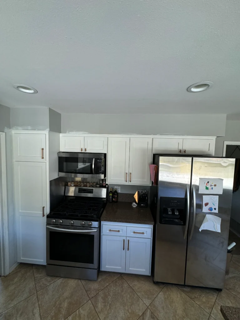 kitchen reface project with shaker doors and modern copper hardware