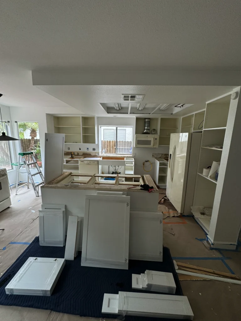 before and after photos of a white shaker cabinet update