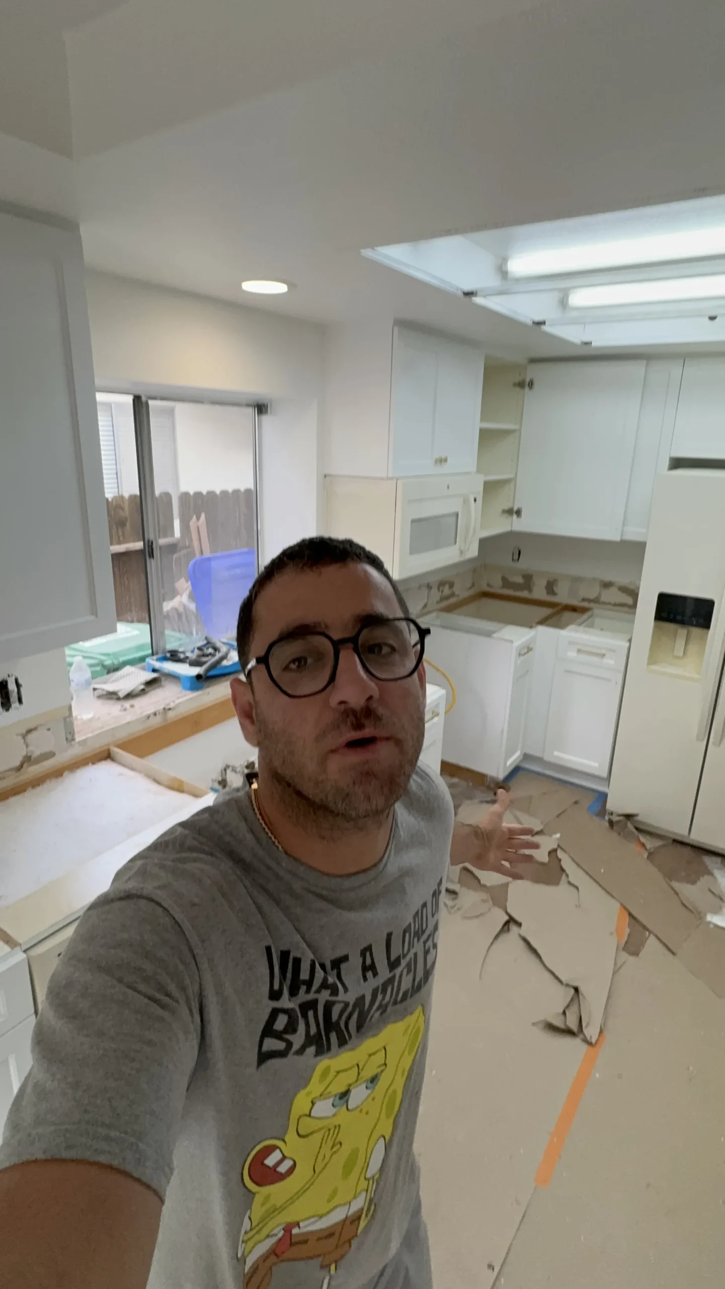 before and after photos of a white shaker cabinet update