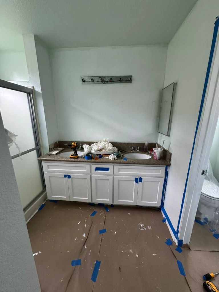 before and after photos of a white shaker cabinet update