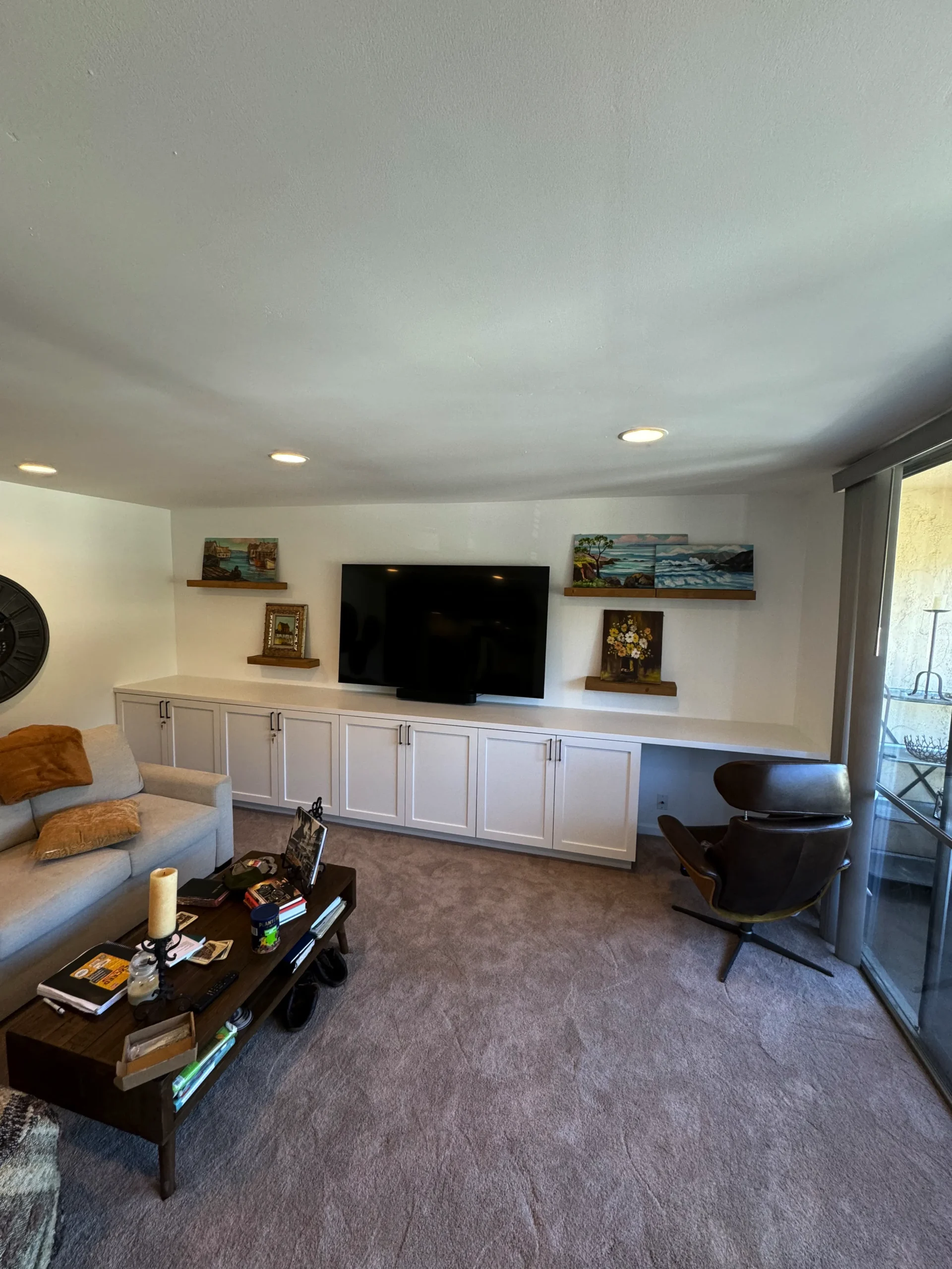 living room with custom tv stand and storage in La Jolla