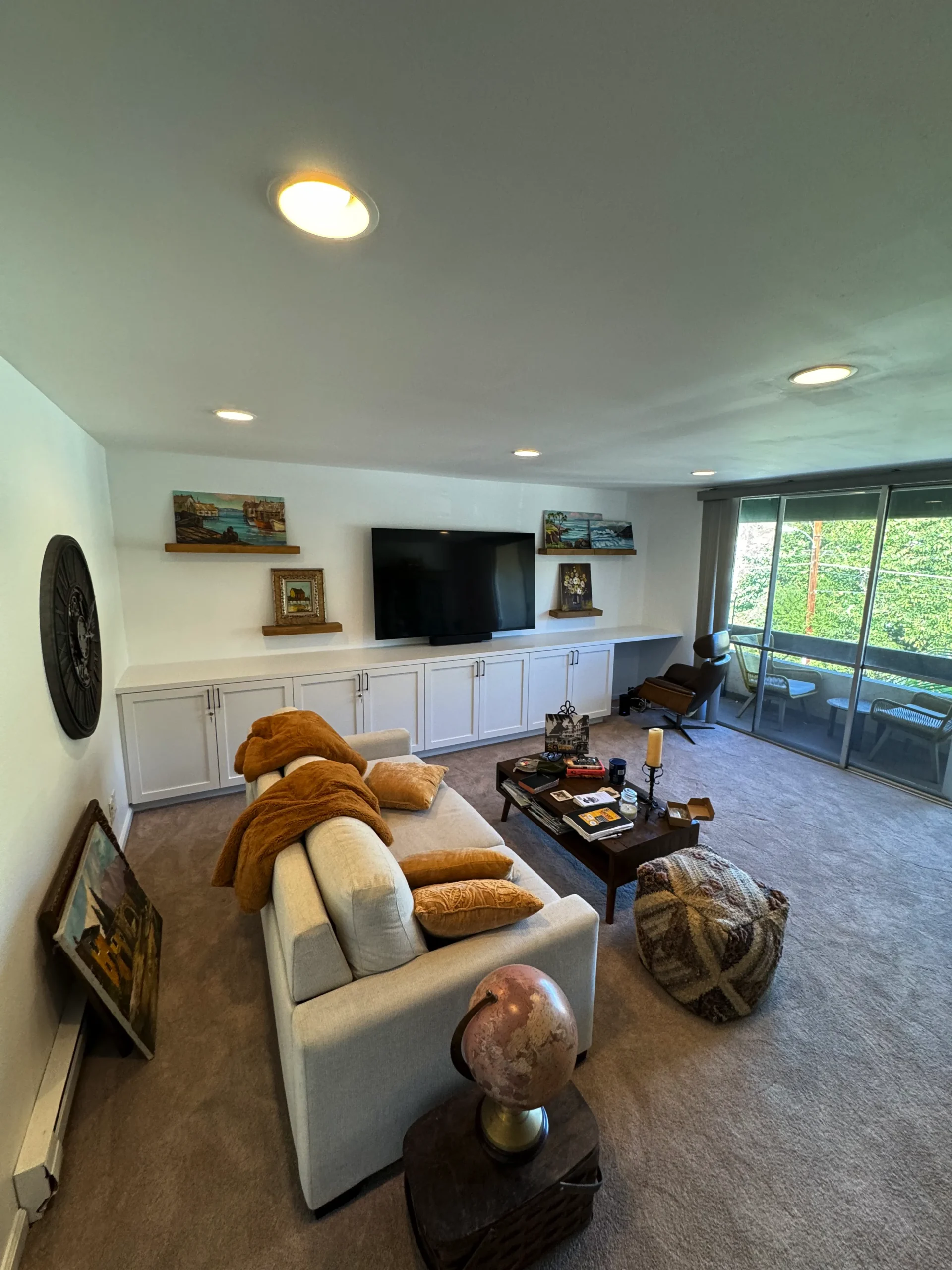 living room with custom tv stand and storage in La Jolla