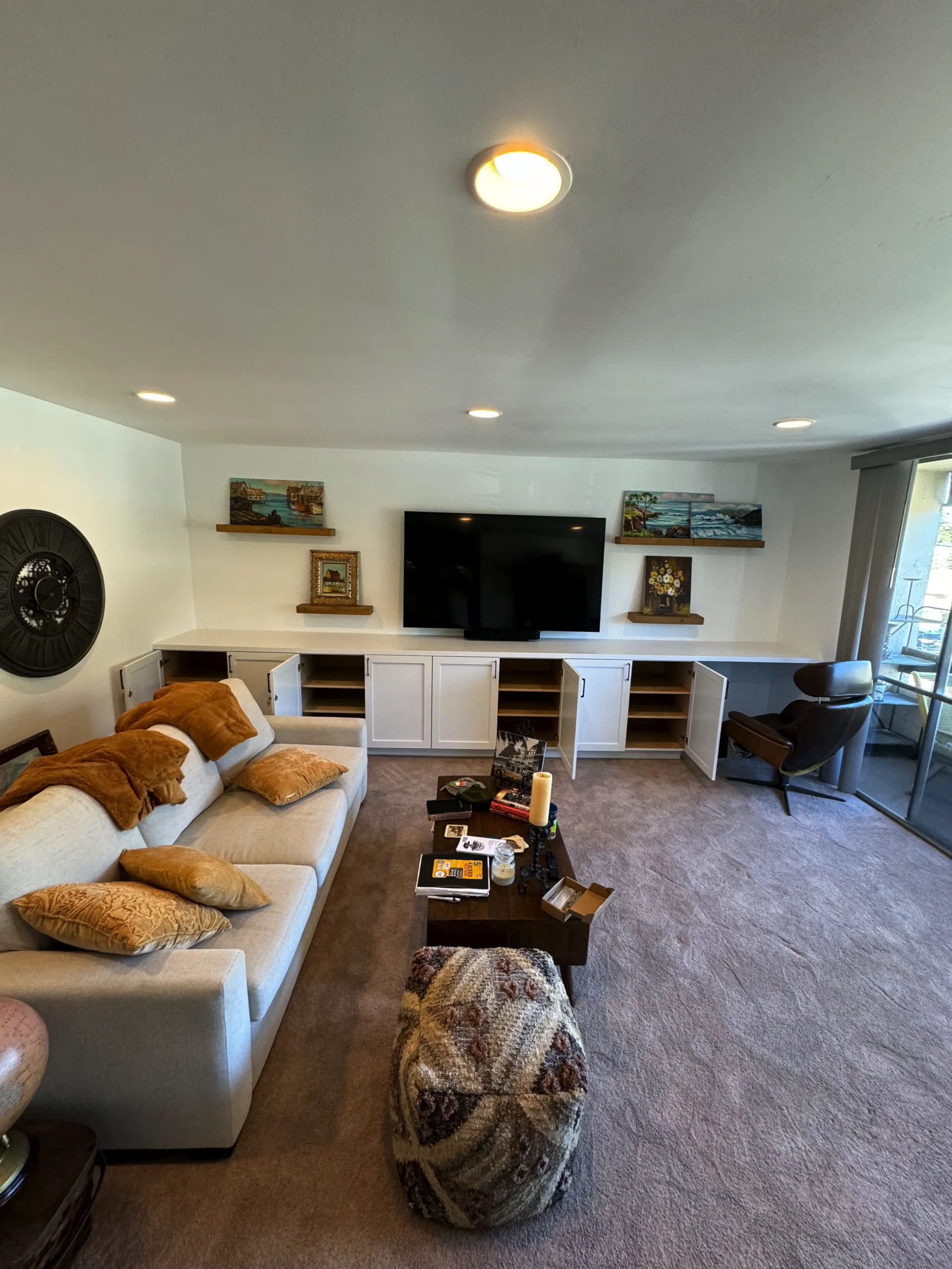 living room with custom tv stand and storage in La Jolla