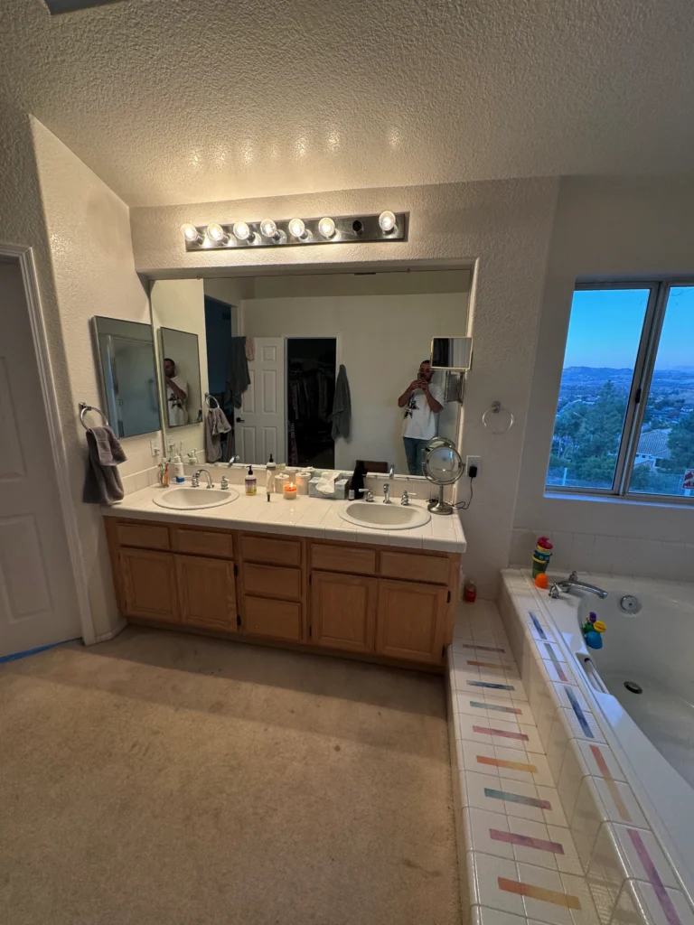 before and after master bathroom remodel with a modern shaker vanity