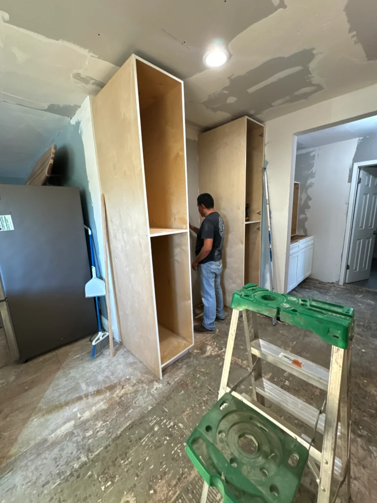 natural wood kitchen island with white quartz countertop in Escondido