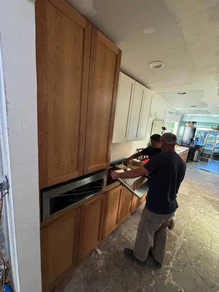 natural wood kitchen island with white quartz countertop in Escondido