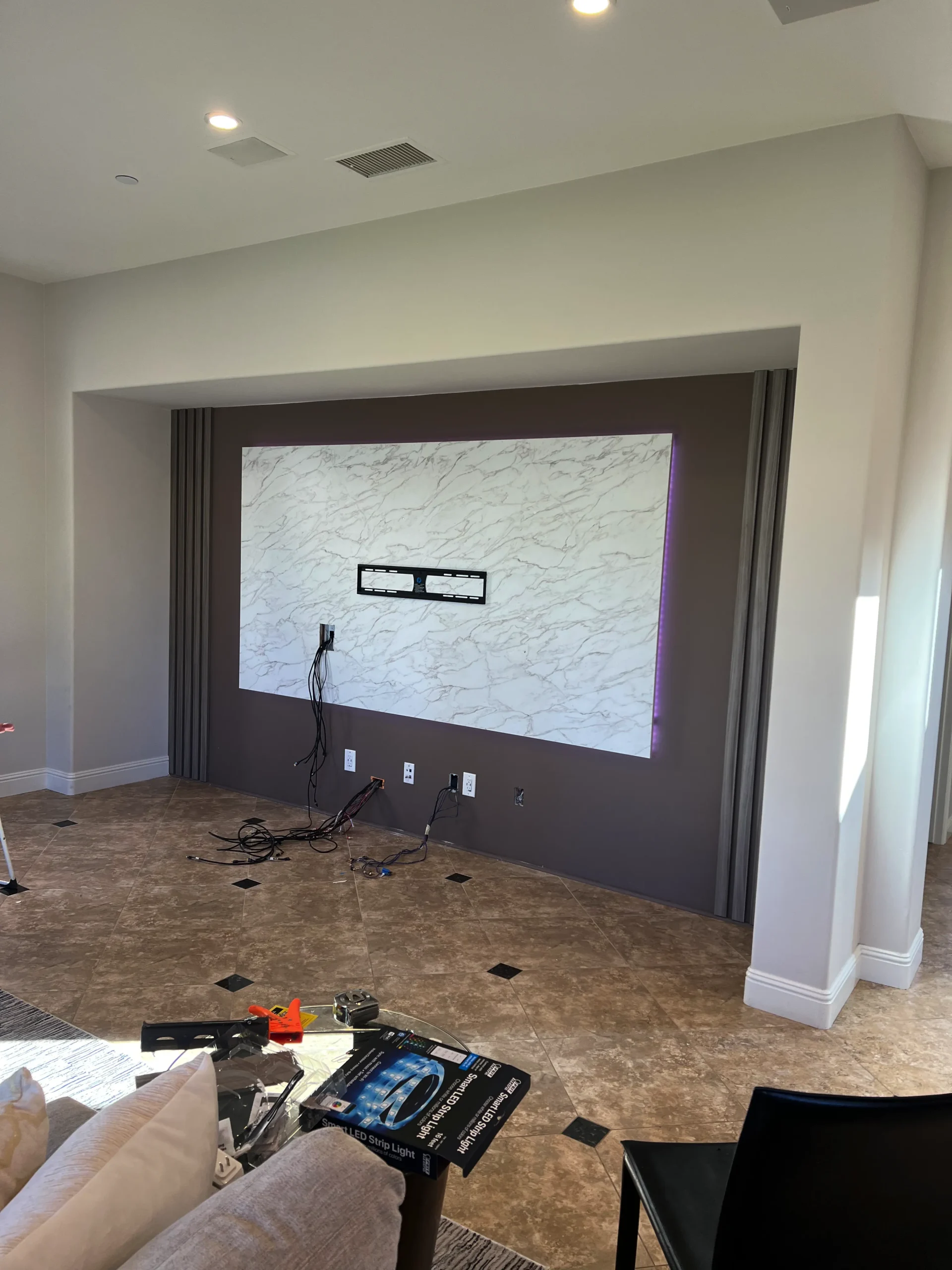 modern entertainment center with LED backlighting and a floating console