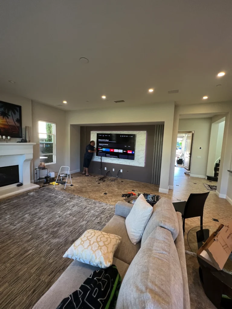 modern entertainment center with LED backlighting and a floating console