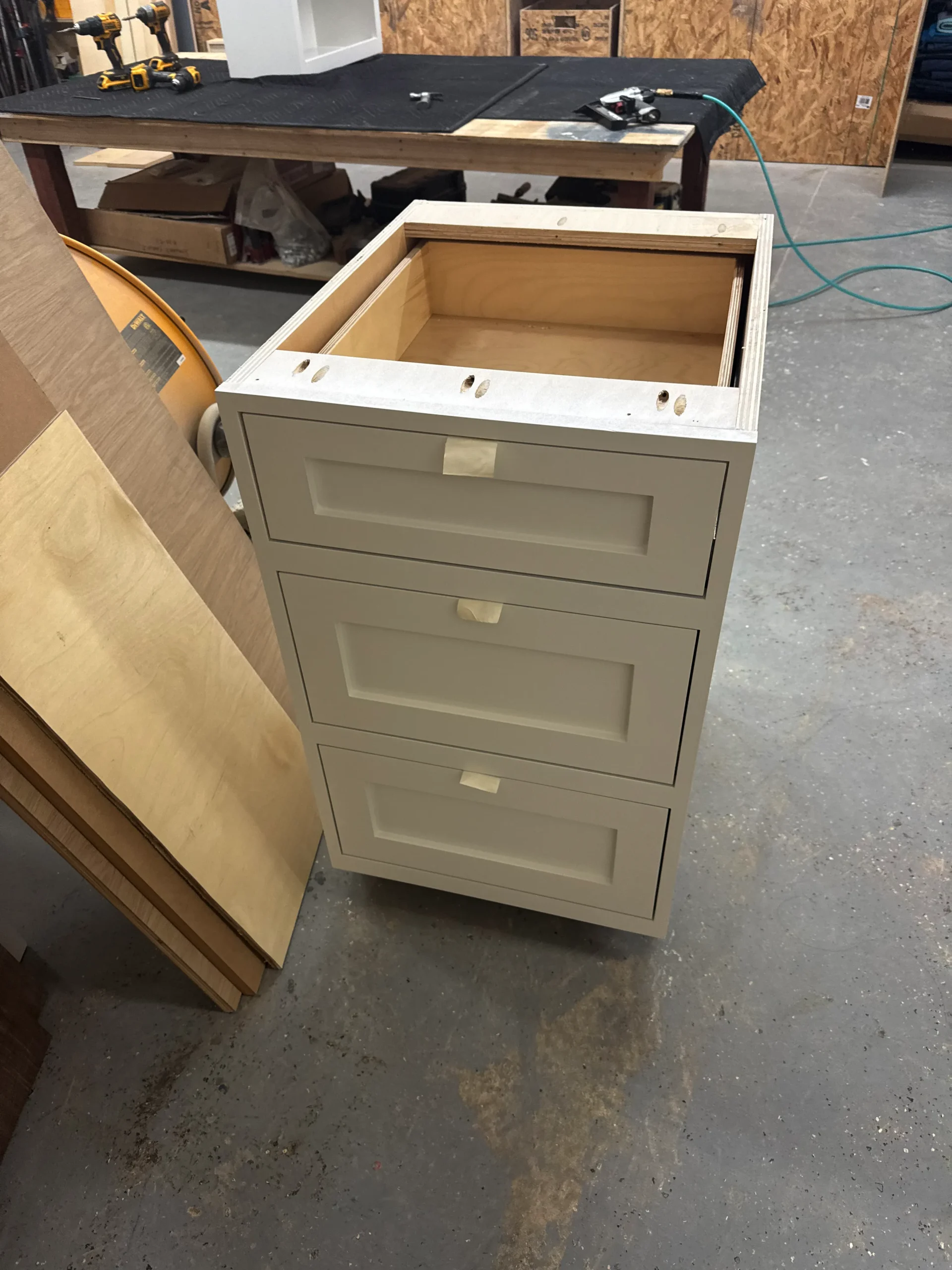 white shaker office cabinets with stained white oak shelves
