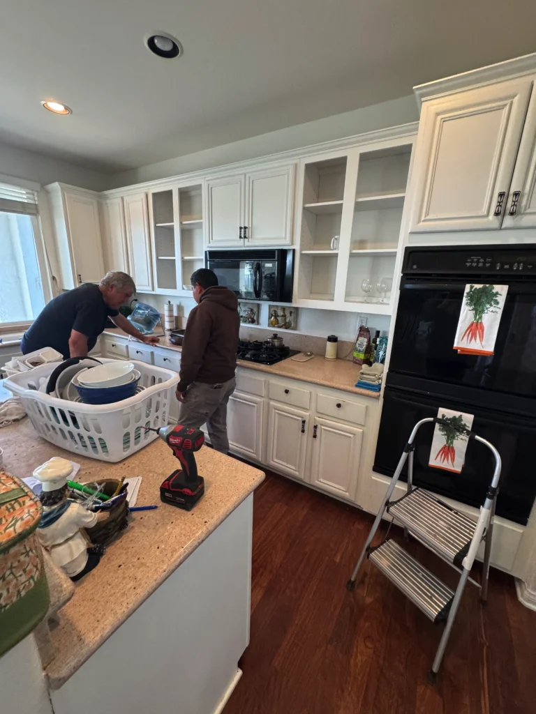 before and after transformation to white shaker cabinets