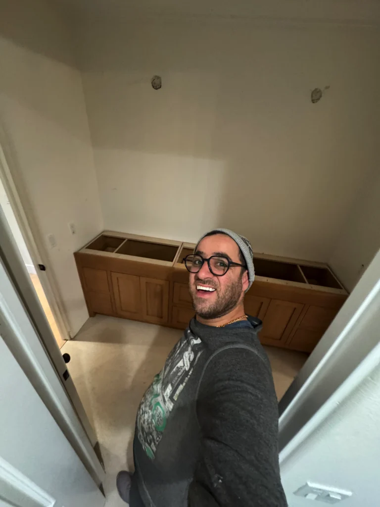 master bathroom remodel with a stained wood double vanity