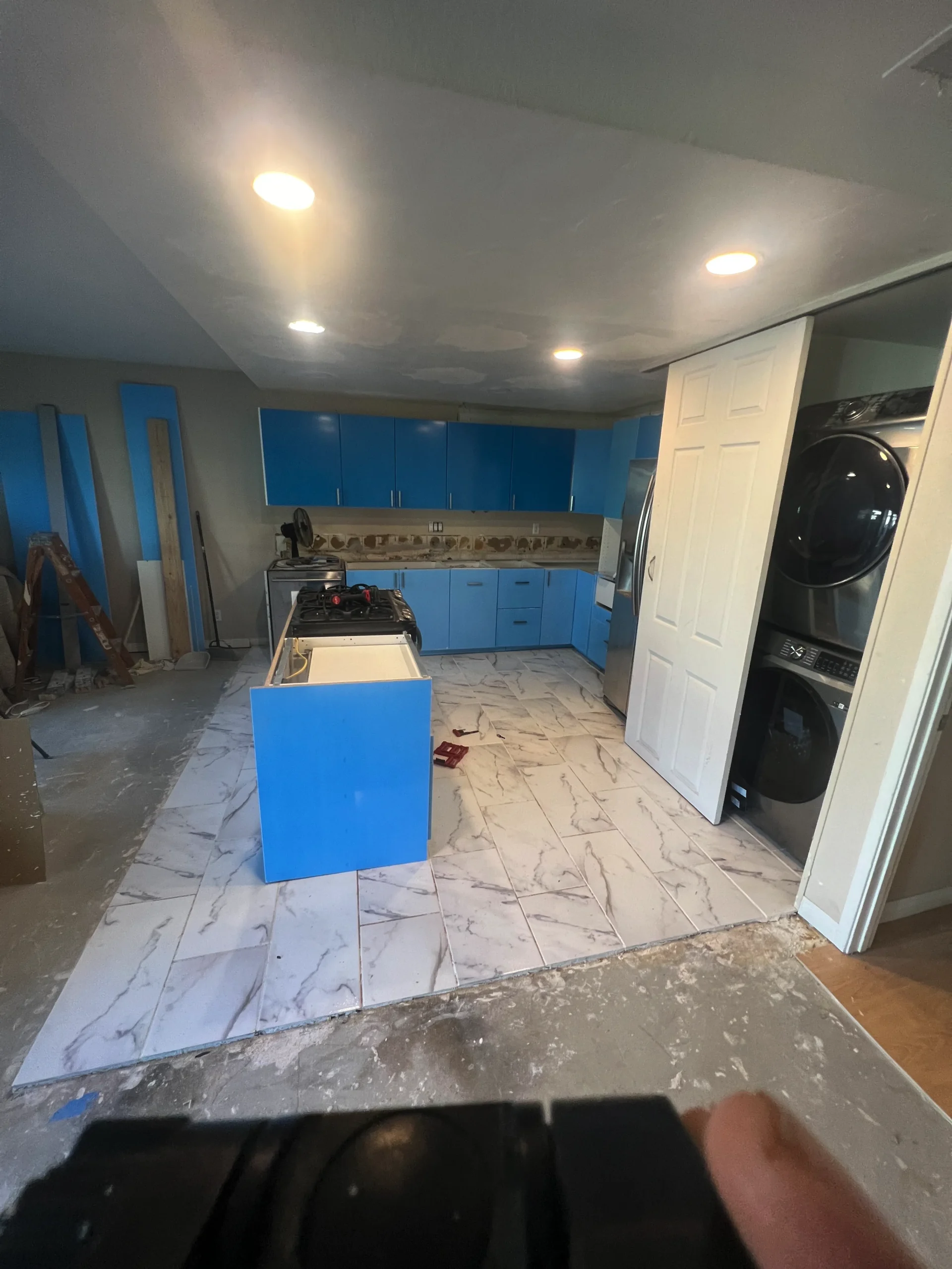 Samad's kitchen with aqua and white IKEA cabinets and island