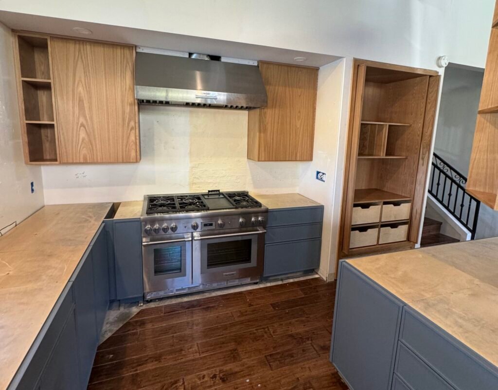 Stylish kitchen storage cabinets by Reza Custom Cabinet