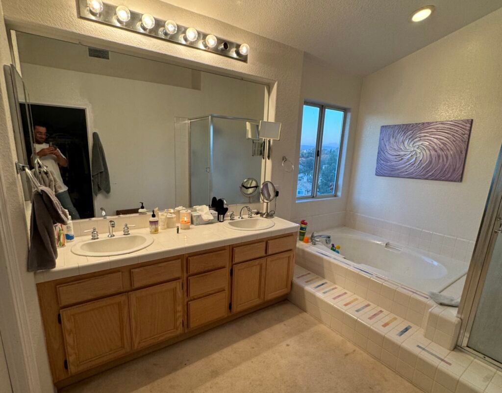 Stylish built-in bath cabinets from Reza Custom