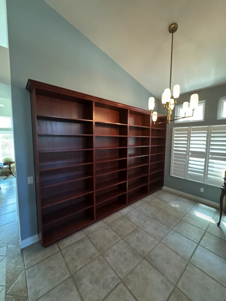 floor-to-ceiling cherry wood built-in bookcase for a home library