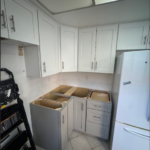 Modern kitchen with white fridge